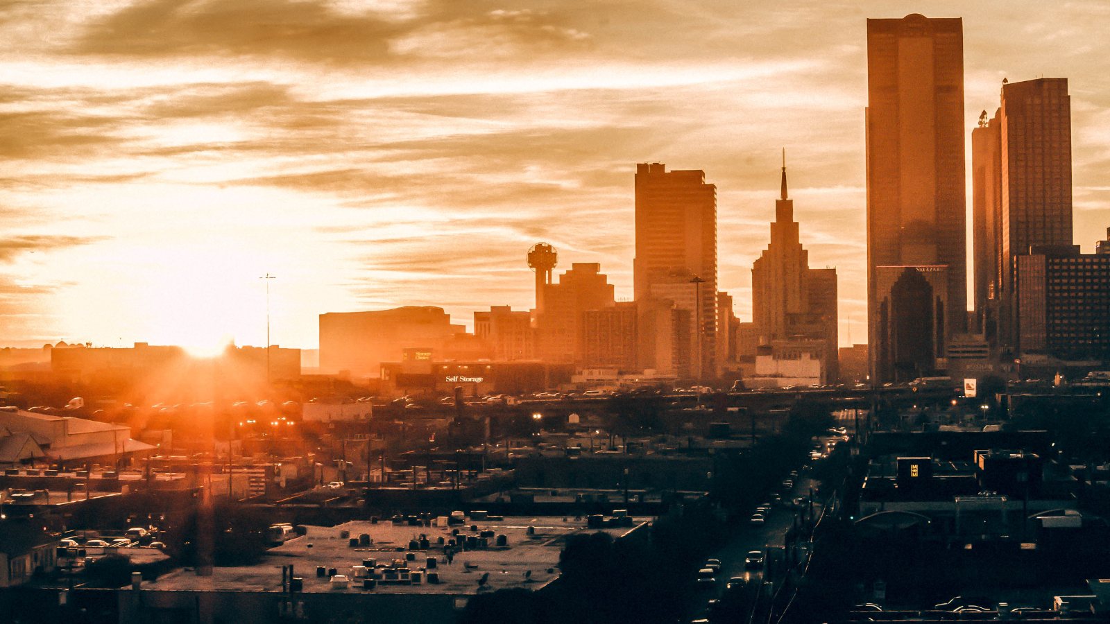 A North American city skyline at sunset