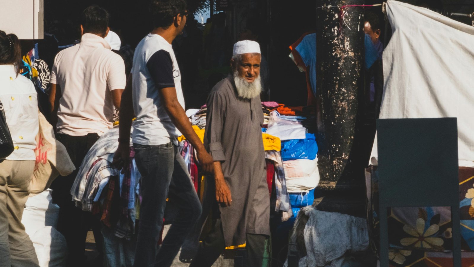 A man walking along a city street